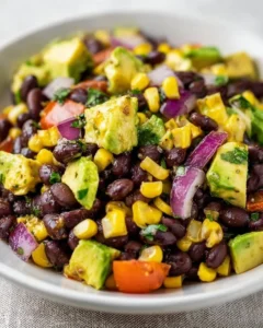 Colorful Black Bean Corn Avocado Salad with fresh ingredients