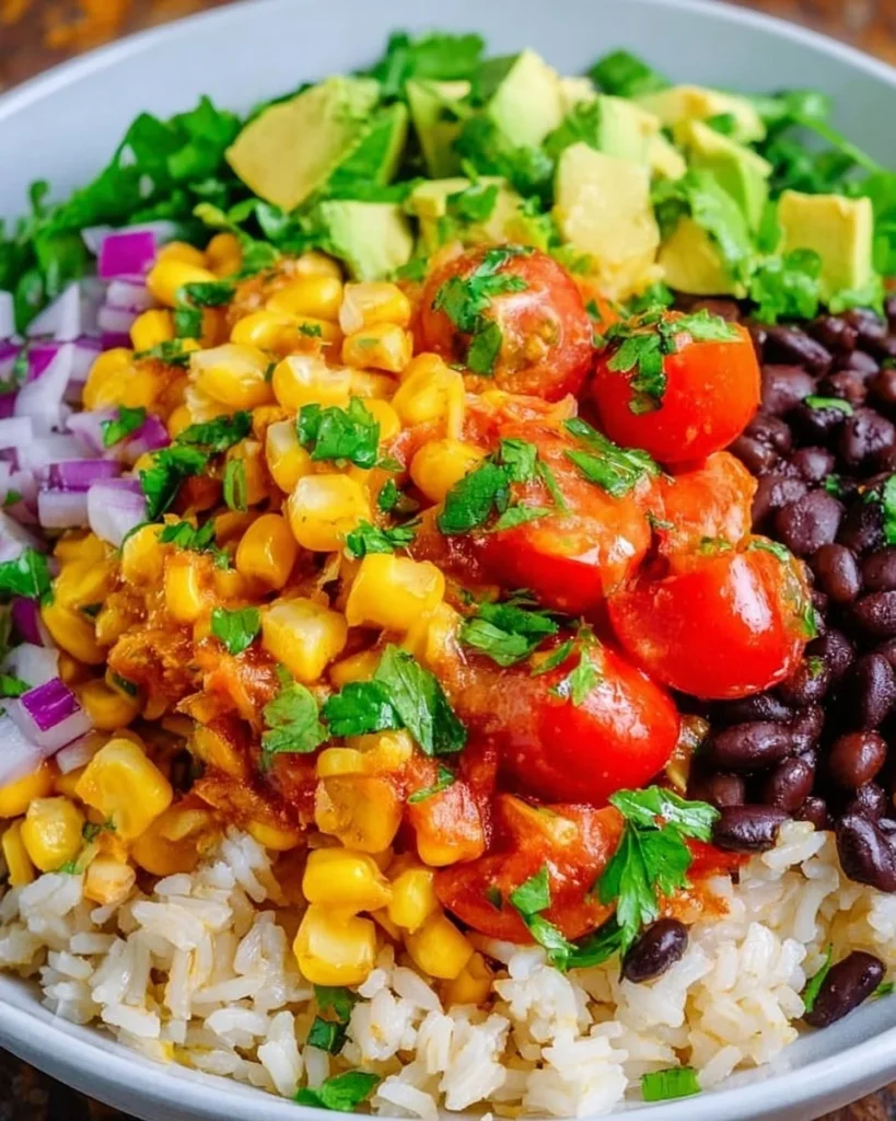 Burrito bowl salad with fresh ingredients and colorful toppings